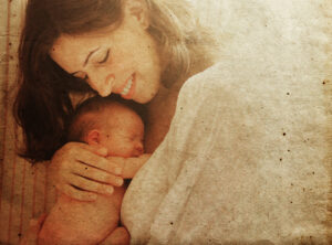 Mother with her baby. Photo in old image style.